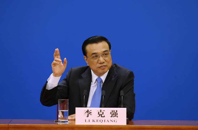 3月15日，國務院總理李克強在北京人民大會堂與中外記者見面，并回答記者提問。 新華社記者 沈伯韓 攝