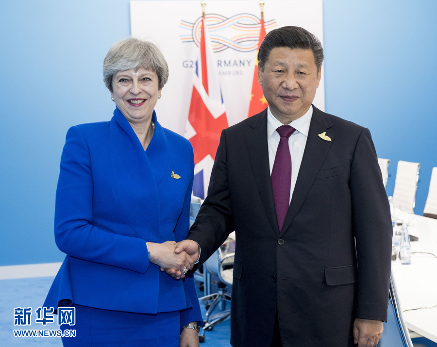 7月7日，國(guó)家主席習(xí)近平在漢堡會(huì)見(jiàn)英國(guó)首相特雷莎·梅。 新華社記者李學(xué)仁 攝